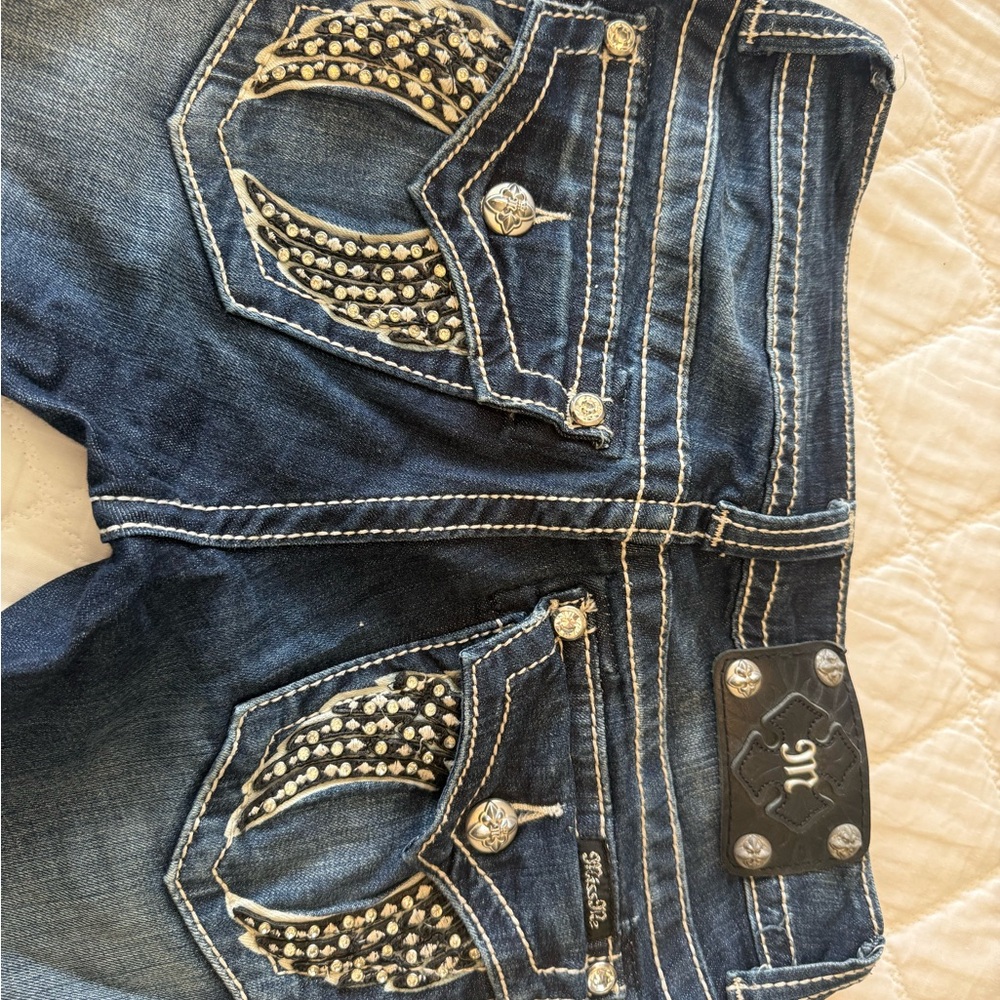 Women's Miss Me Blue Jeans with Embellished Pockets size 25